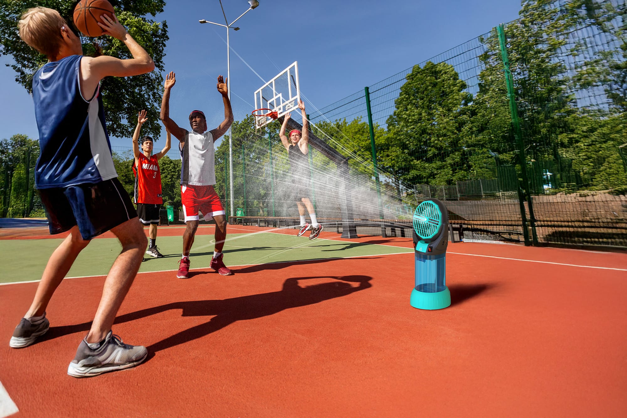AlphaCool misting fan cooling basketball players on an outdoor court